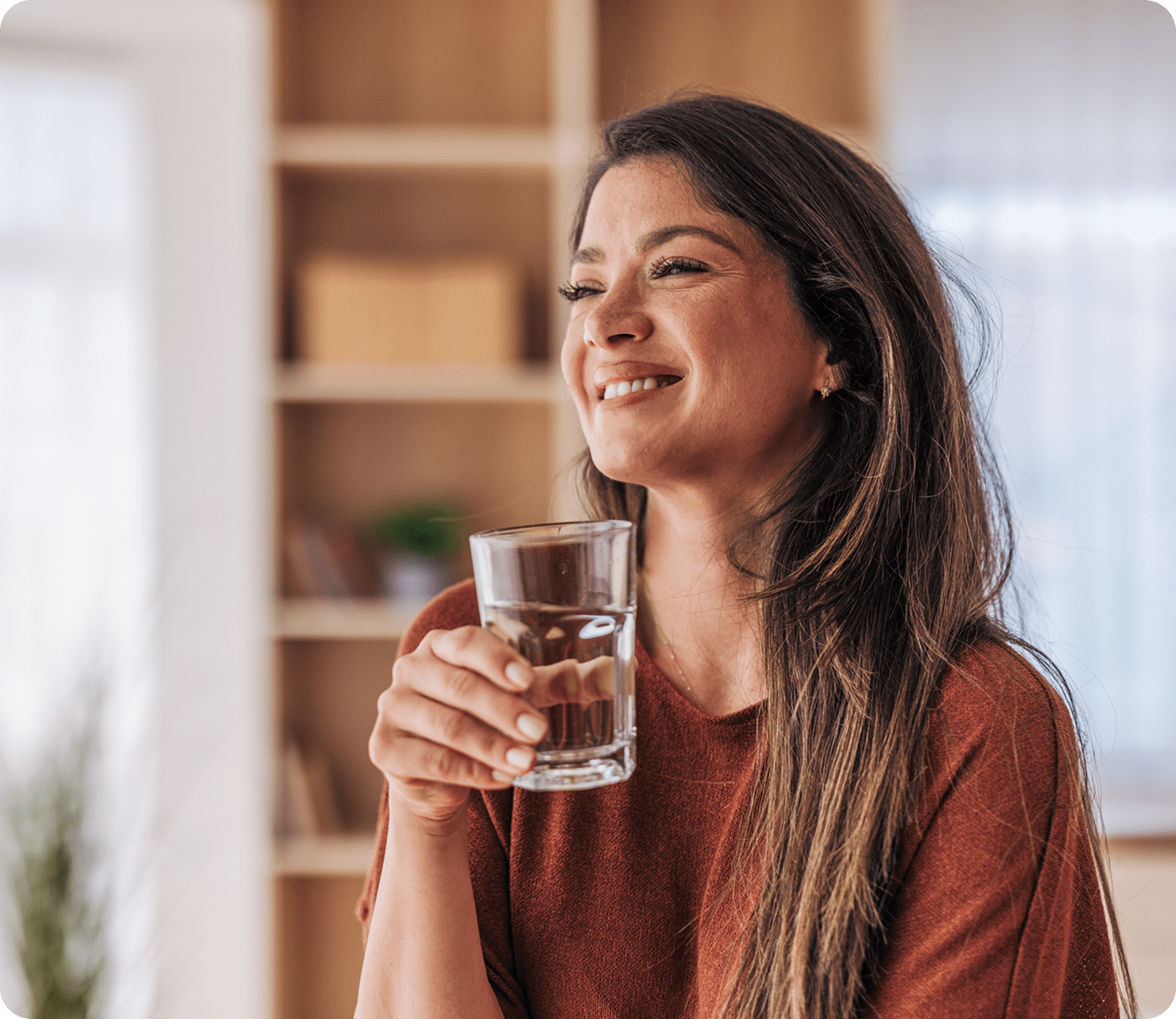 Relaxed woman enjoying a beverage