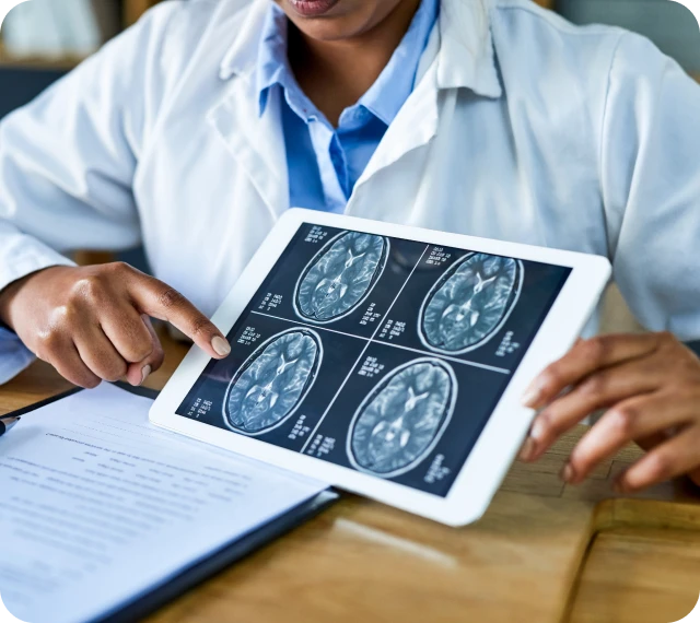 Medical professional analyzing MRI images